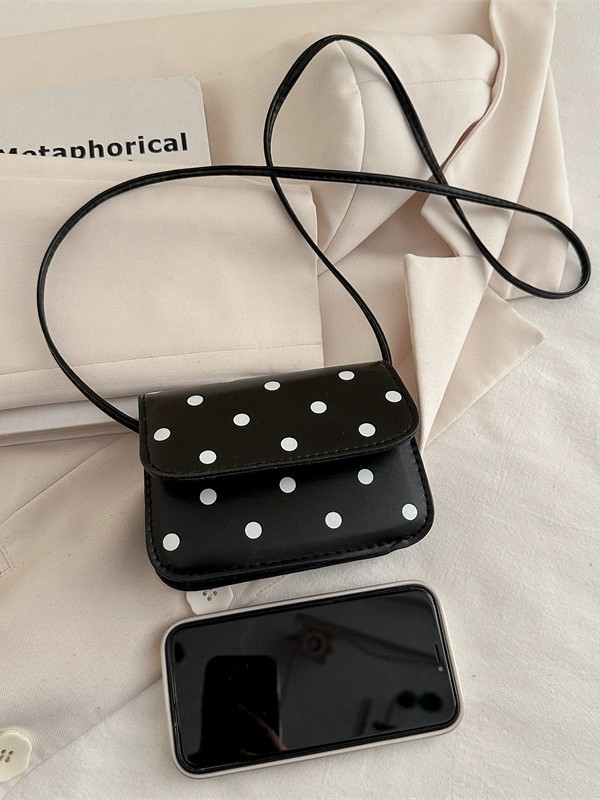 Mini crossbody torbica s točkastim uzorkom i elegantnom teksturom