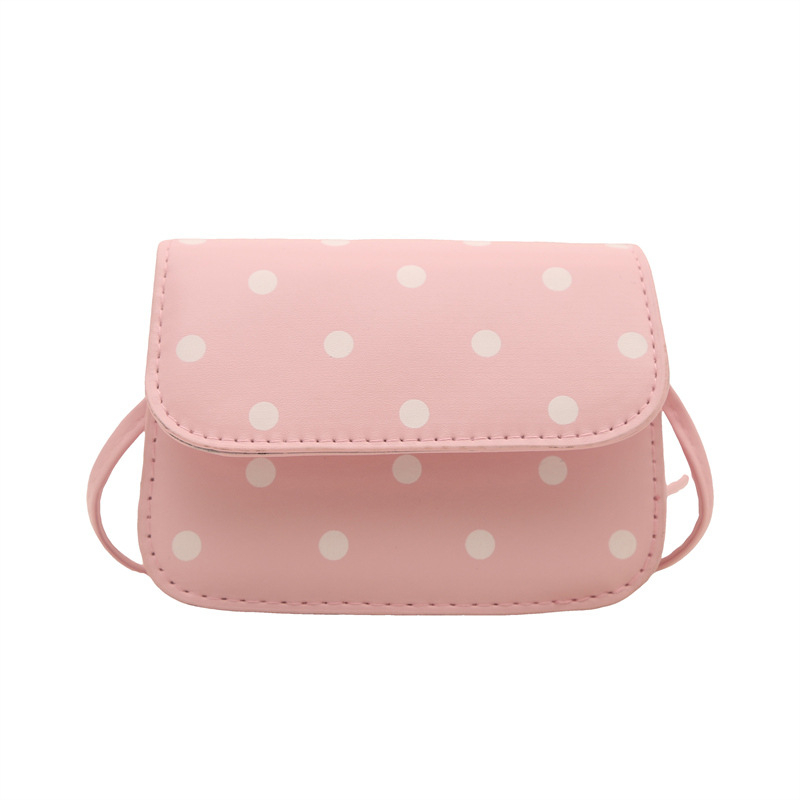 Mini crossbody torbica s točkastim uzorkom i elegantnom teksturom