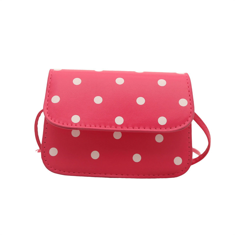 Mini crossbody torbica s točkastim uzorkom i elegantnom teksturom
