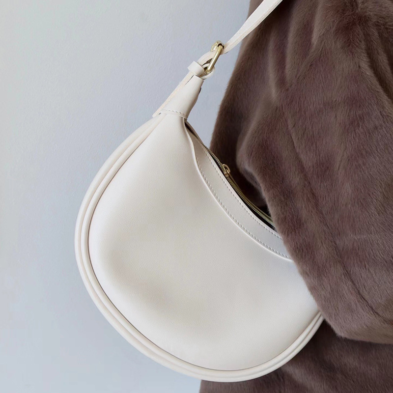 Ženska PU torba – sedlovog oblika, crossbody, za svakodnevnu uporabu, dizajn 2025