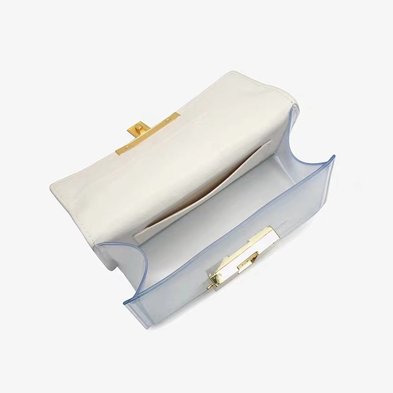 Ženska torbica Saddle s uzorkom krokodila, prozirni paneli i dizajn s blok boja; nosi se na ramenu ili crossbody