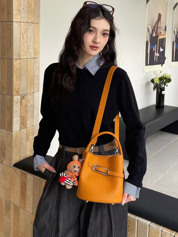 Prava kožna bucket torba s vezicom i crossbody remenom – za svakodnevnu uporabu