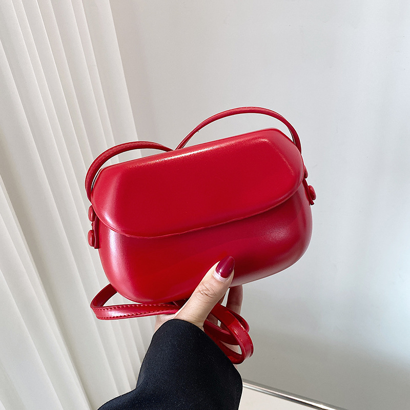 Ženska PU kružna crossbody torba, srednja veličina, magnetsko zatvaranje