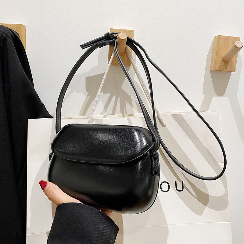Ženska PU kružna crossbody torba, srednja veličina, magnetsko zatvaranje