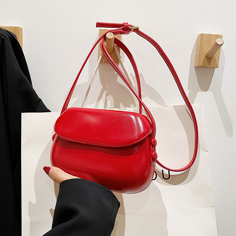 Ženska PU kružna crossbody torba, srednja veličina, magnetsko zatvaranje