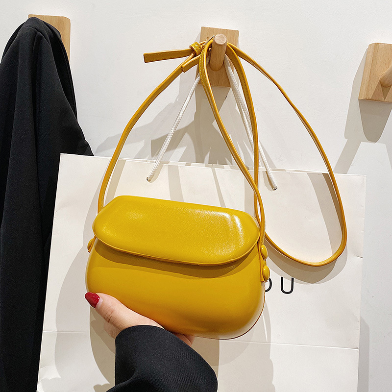 Ženska PU kružna crossbody torba, srednja veličina, magnetsko zatvaranje