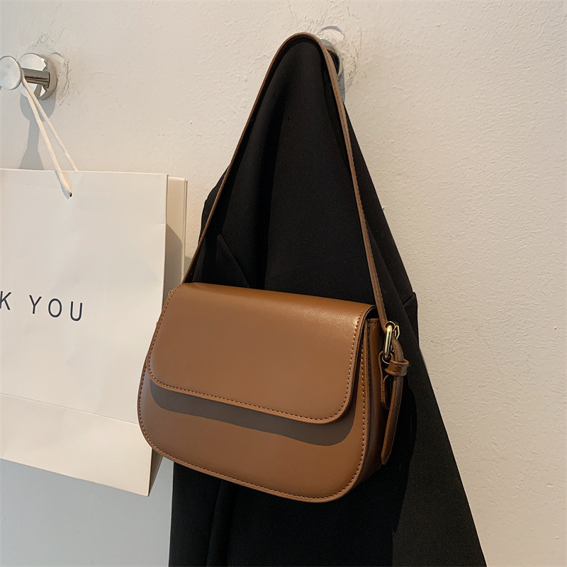 Prilagođena ženska torbica srednje veličine kvadratnog oblika, s teksturom visokog kvaliteta, jednobojna, elegantna i minimalistička, crossbody torba s jednim remenom