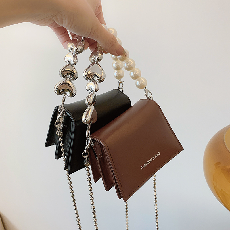 Ženska street-style mini kvadratna torbica, torbica za ruž i slušalice s lancem, preko ramena
