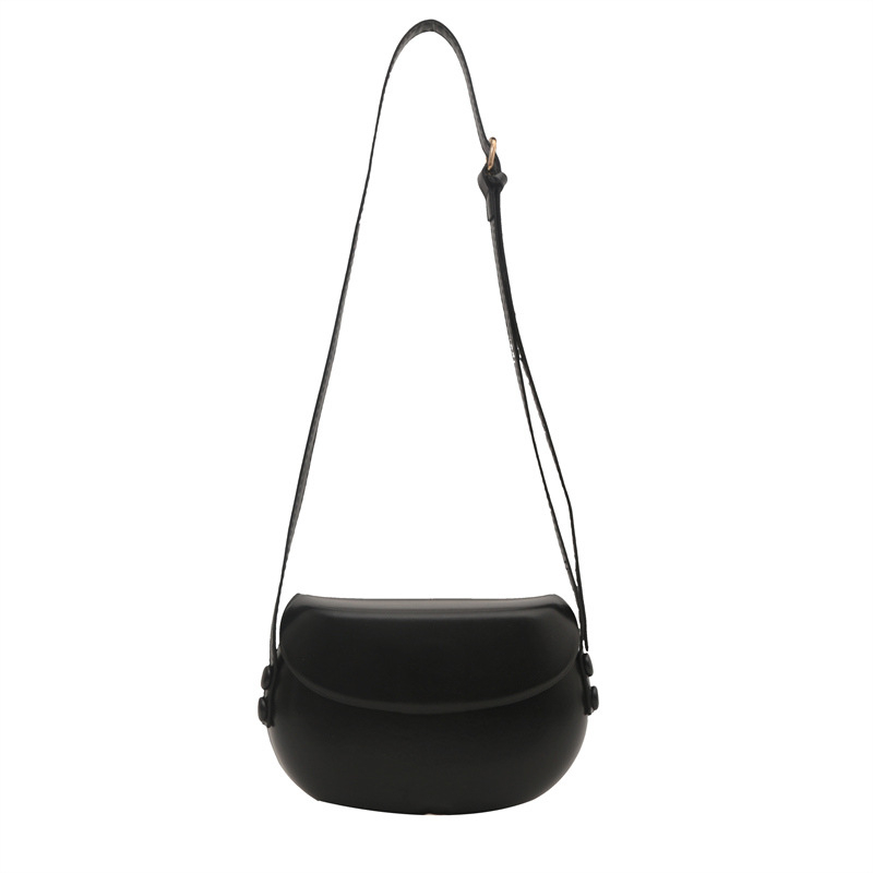 Ženska torba s korejskim nišnim dizajnom, proljeće 2024, minimalistička, dnevna, sedlo oblik, crossbody remen
