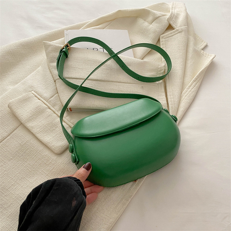 Ženska torba s korejskim nišnim dizajnom, proljeće 2024, minimalistička, dnevna, sedlo oblik, crossbody remen