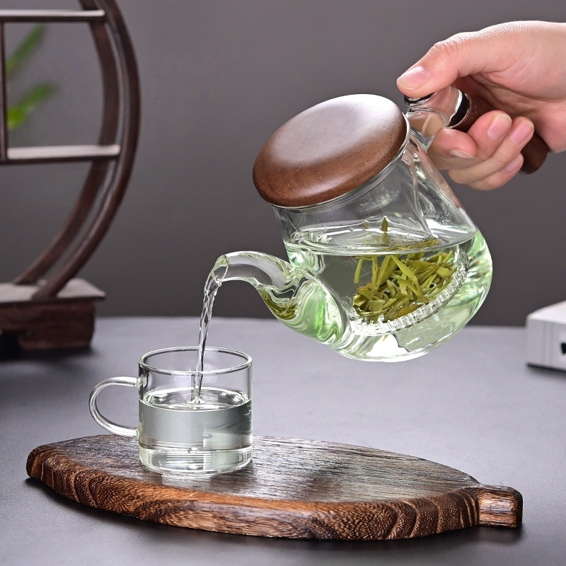 Ceainic din sticlă rezistentă la căldură, mâner lateral, capac din nuc, borosilicat înalt, separator ceai-apă, pentru birou