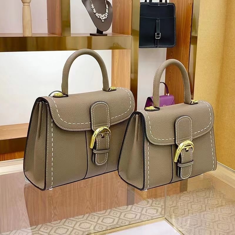 Ženska torbica 2025 — kožna crossbody torba sa sedlastim oblikom, kopčom u obliku potkove, vintage Kelly torba od prave kože