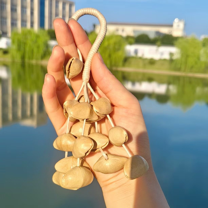 DIY set za privjesak za torbu od ljuske oraščića i zvončić vjetra