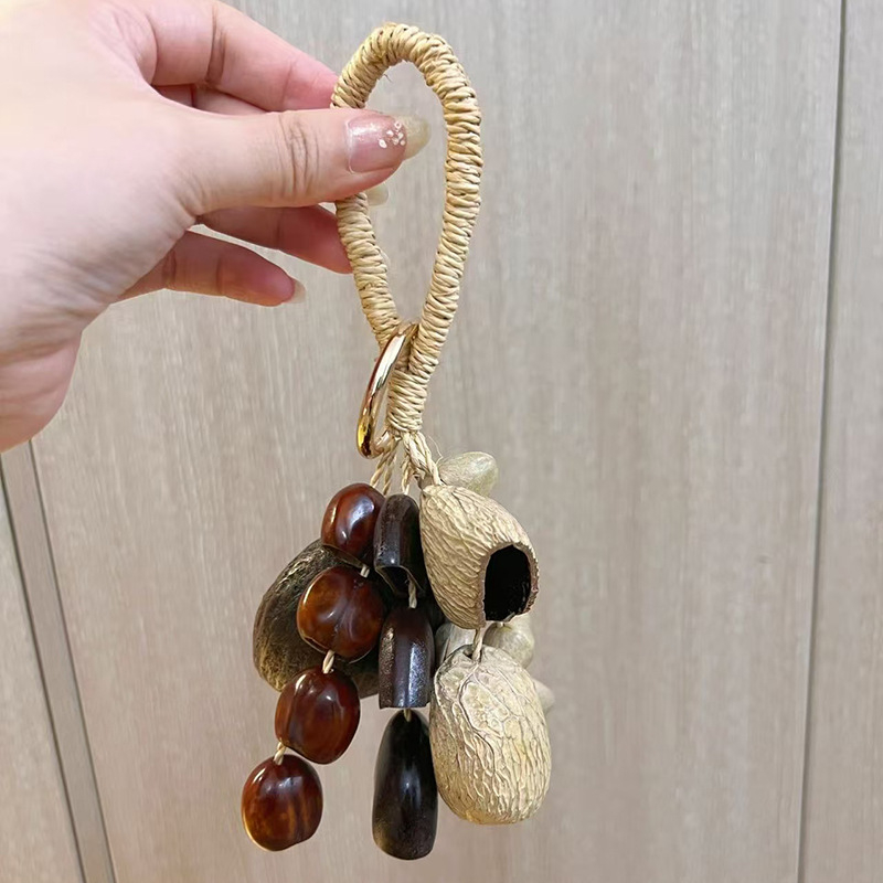 DIY set za privjesak za torbu od ljuske oraščića i zvončić vjetra