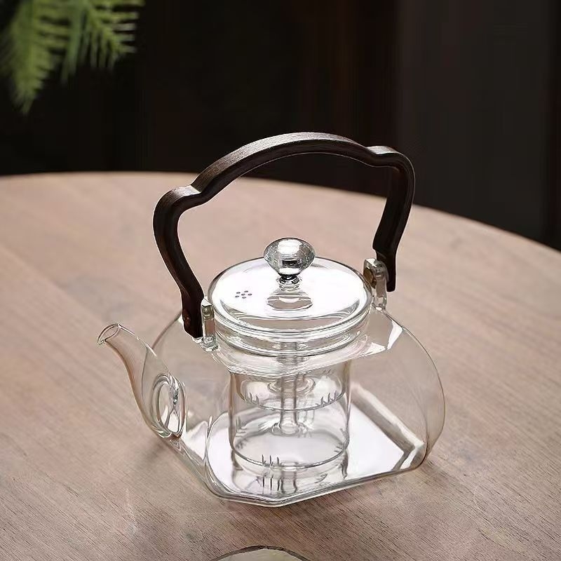 Ceainic din sticlă borosilicată, cu mâner pentru ridicare, pentru prepararea ceaiului pe aragaz, uz casnic