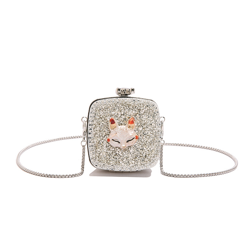 Mini srcolika akrilna crossbody torbica s kristalima i lancem za ruž
