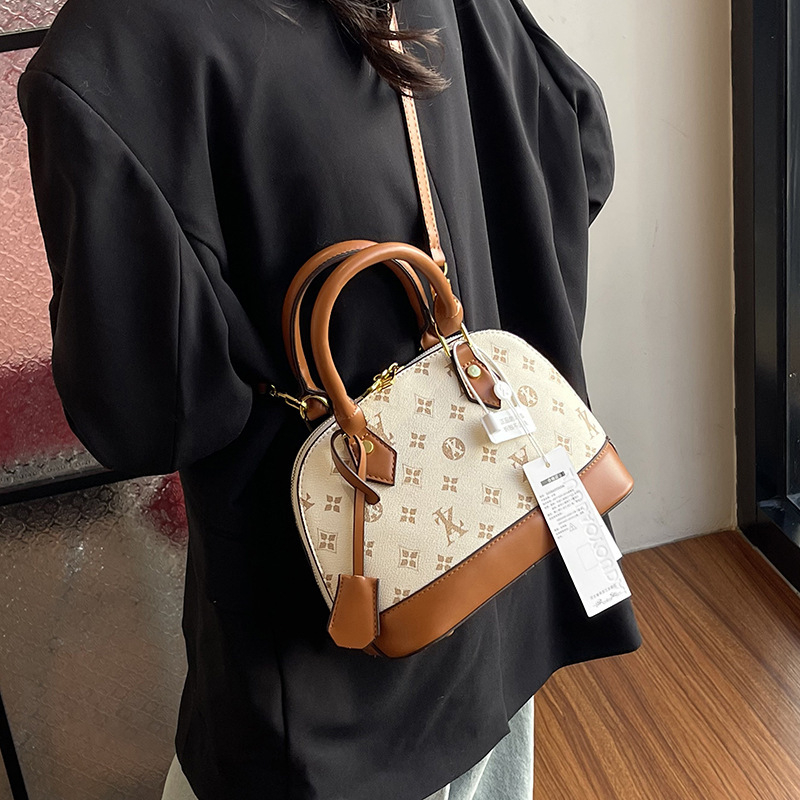 Ženska torbica u obliku školjke, novi model 2025, elegantan stil, moderna torba za rame i crossbody