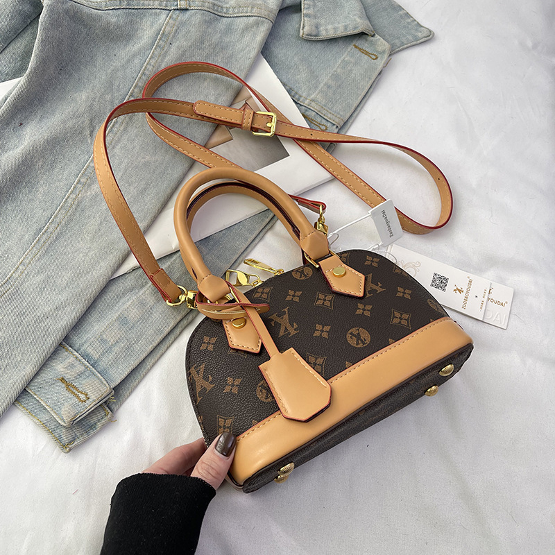 Ženska torbica u obliku školjke, novi model 2025, elegantan stil, moderna torba za rame i crossbody