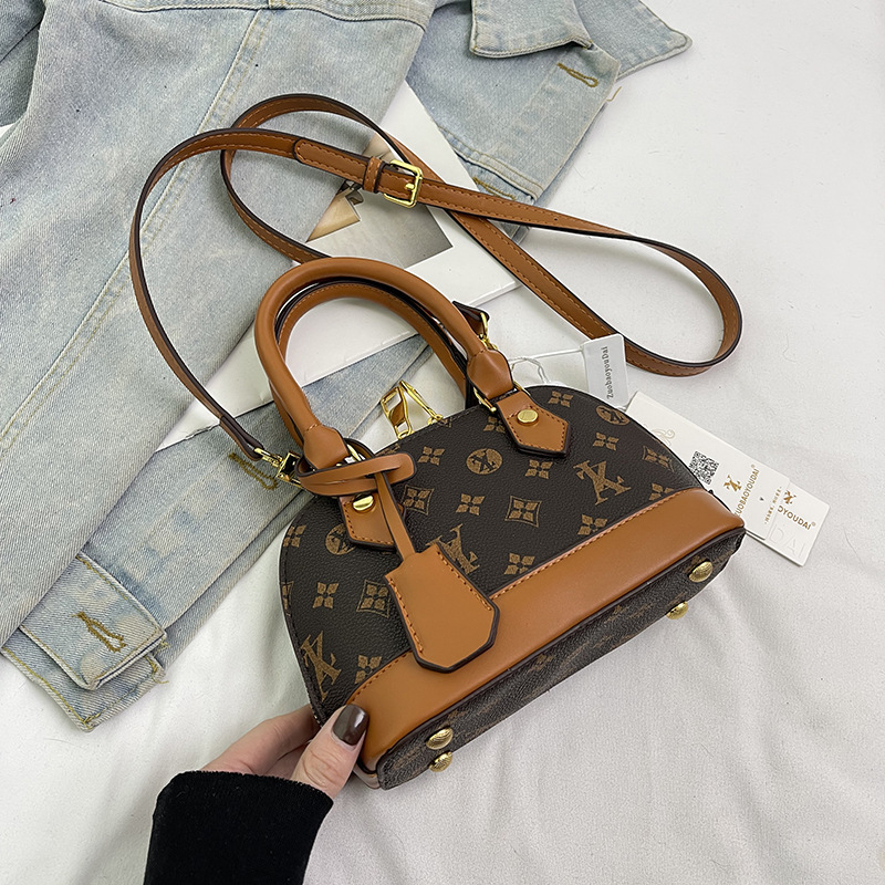 Ženska torbica u obliku školjke, novi model 2025, elegantan stil, moderna torba za rame i crossbody