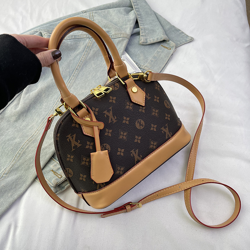 Ženska torbica u obliku školjke, novi model 2025, elegantan stil, moderna torba za rame i crossbody