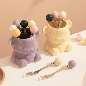 Set ceramic cu ursuleț crem, pentru furculițe și linguri de fructe, în borcan