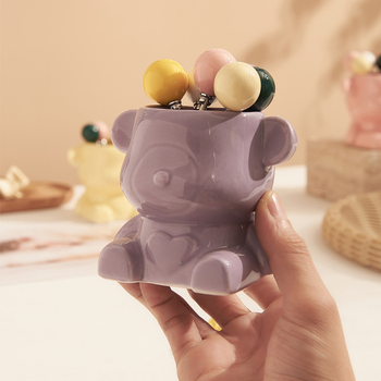 Set ceramic cu ursuleț crem, pentru furculițe și linguri de fructe, în borcan