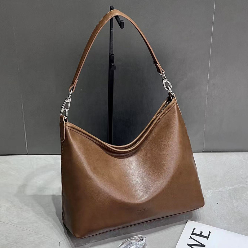 Ženska retro minimalistička crossbody torba – PU koža s maslanim voskom završnim slojem, gradski stil, velika kapaciteta, proljeće 2025
