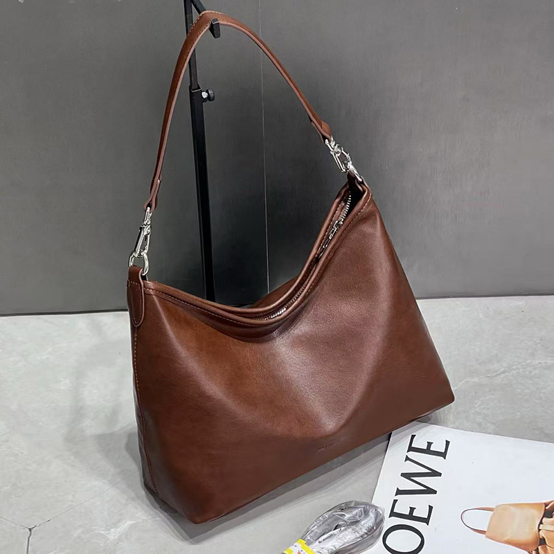 Ženska retro minimalistička crossbody torba – PU koža s maslanim voskom završnim slojem, gradski stil, velika kapaciteta, proljeće 2025