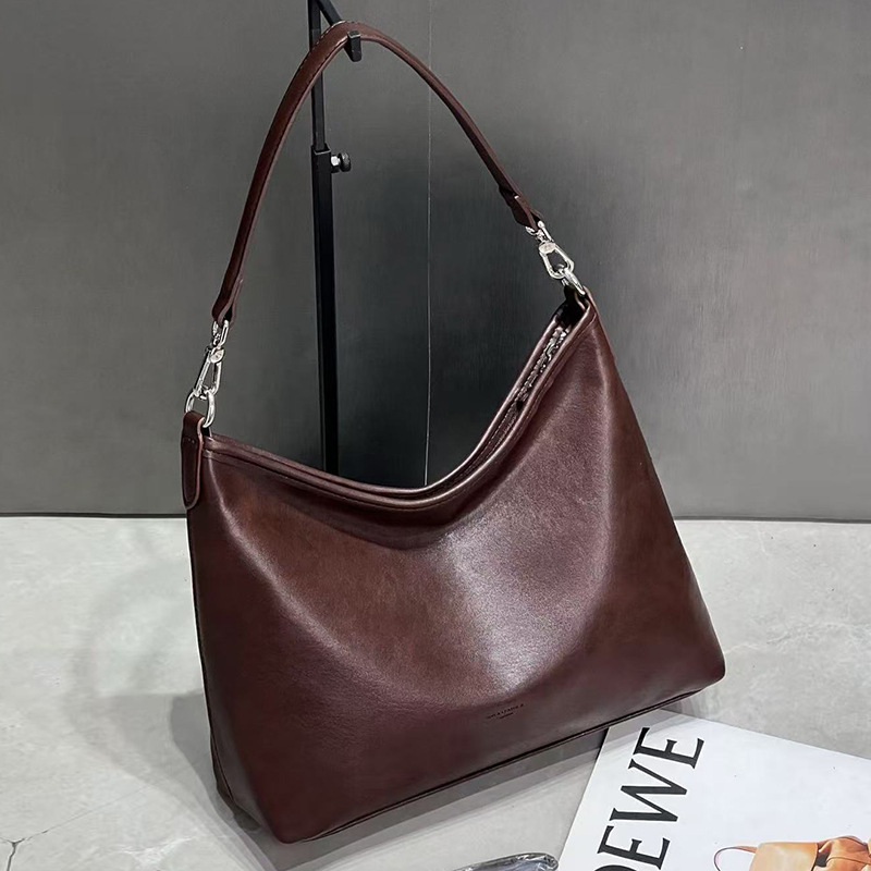 Ženska retro minimalistička crossbody torba – PU koža s maslanim voskom završnim slojem, gradski stil, velika kapaciteta, proljeće 2025