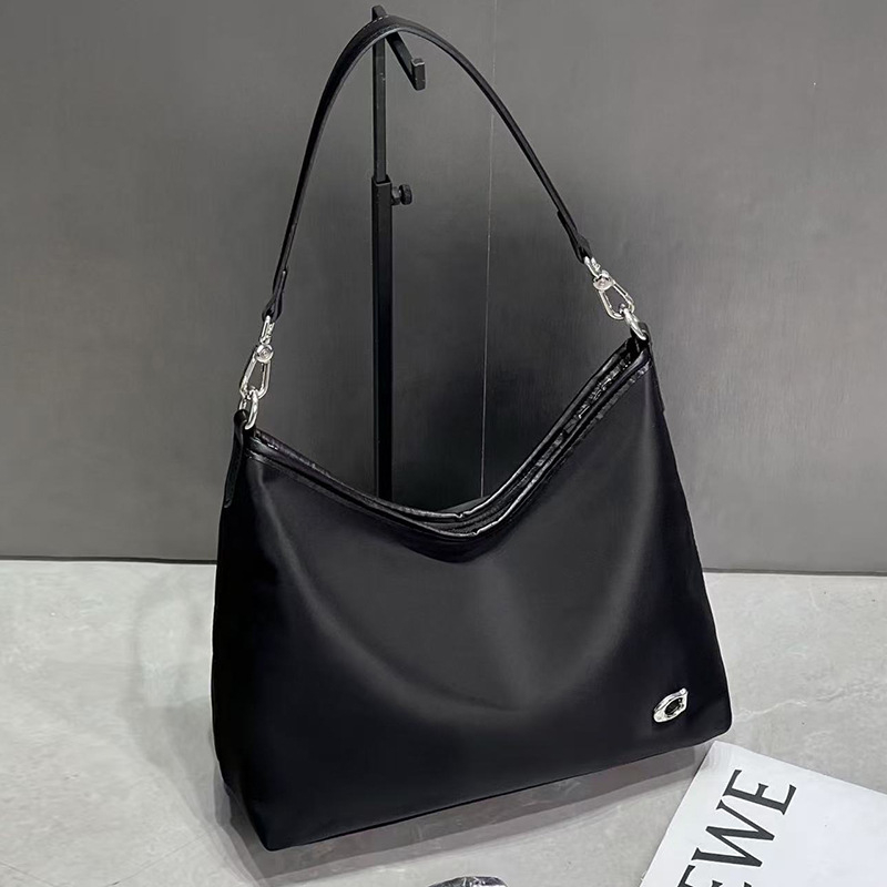 Ženska retro minimalistička crossbody torba – PU koža s maslanim voskom završnim slojem, gradski stil, velika kapaciteta, proljeće 2025