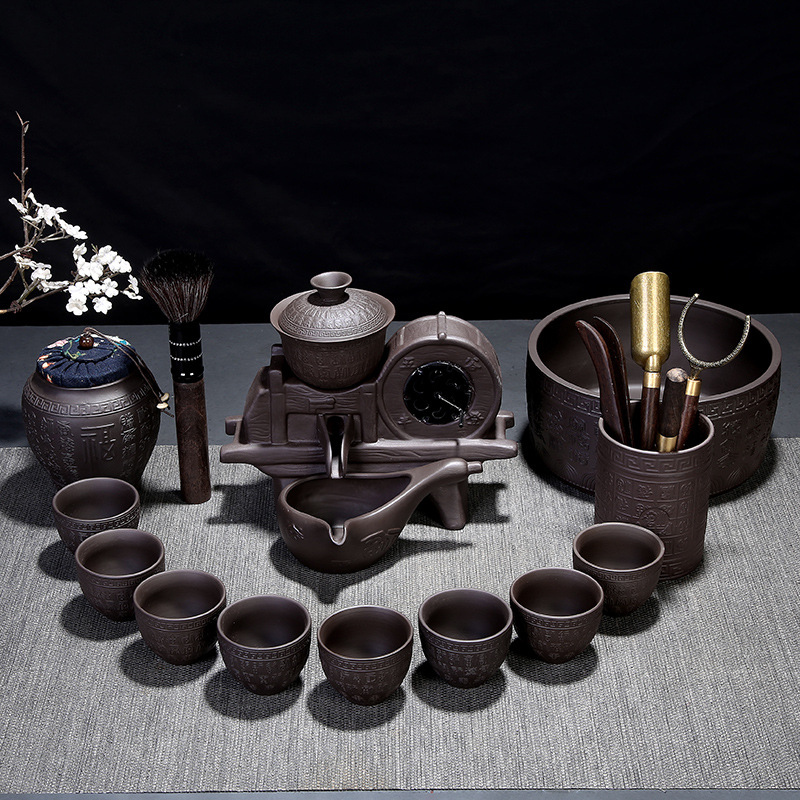 Set Gongfu din lut Yixing semi-automat pentru uz casnic, cu râșniță din piatră.