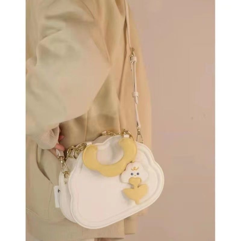 Nova ženska crossbody torba u japanskom stilu – slatka mala kružna PU tote, krem oblak dizajn