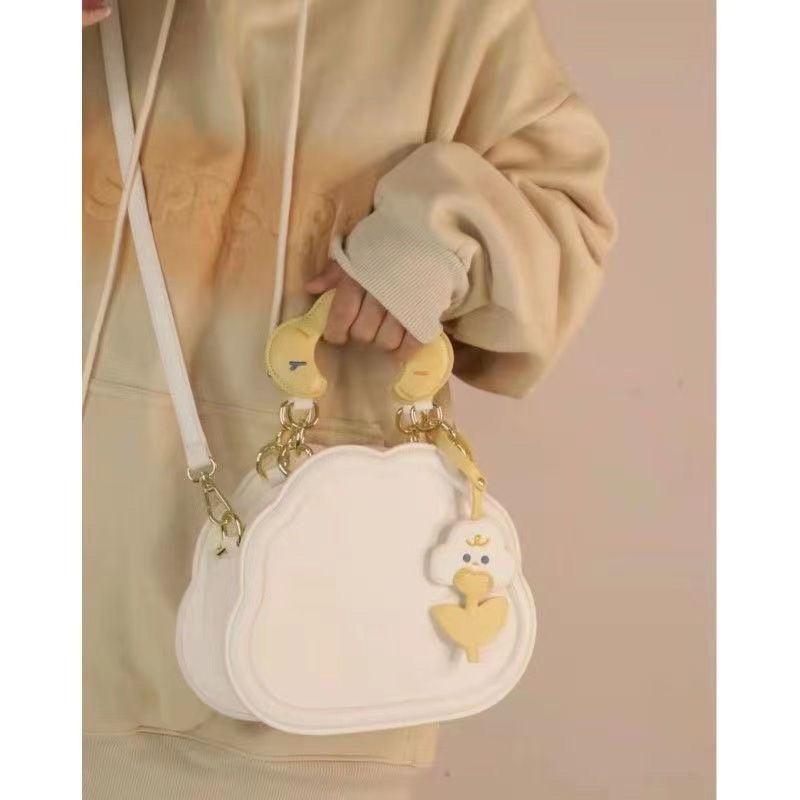 Nova ženska crossbody torba u japanskom stilu – slatka mala kružna PU tote, krem oblak dizajn