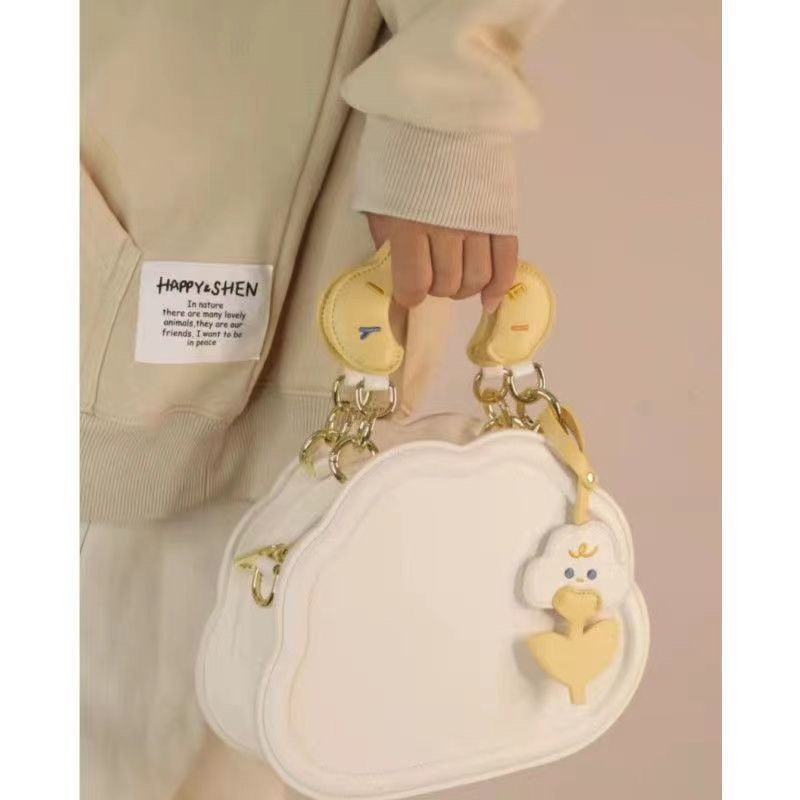 Nova ženska crossbody torba u japanskom stilu – slatka mala kružna PU tote, krem oblak dizajn