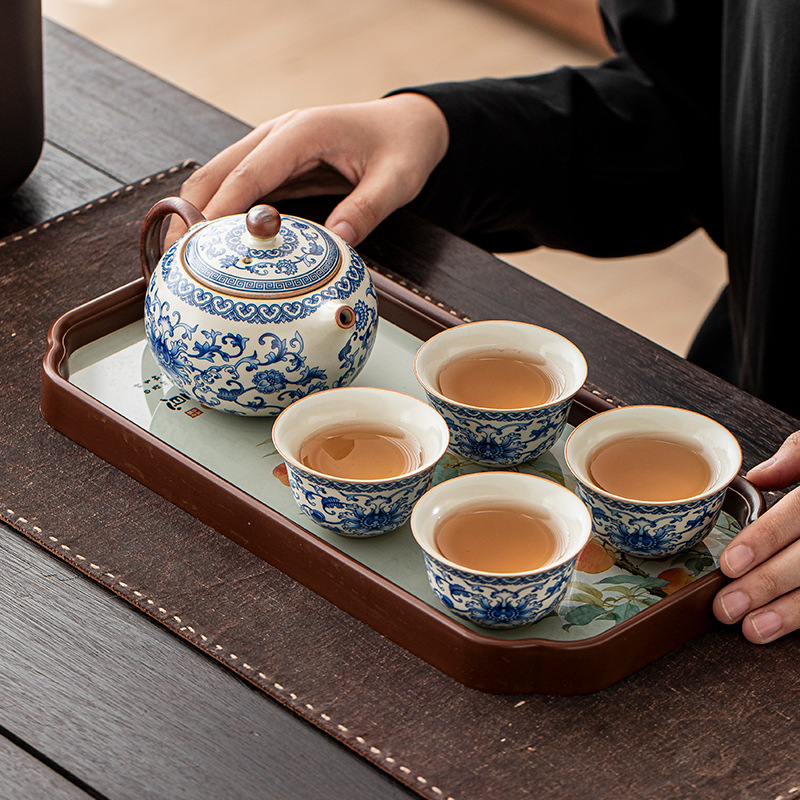 Ceainic Ru Kiln cu lotus albastru-alb, filtru ceramic cu găuri pentru bilă, set Kung Fu de ceai pentru uz casnic, ceainică și ceașcă pentru o persoană