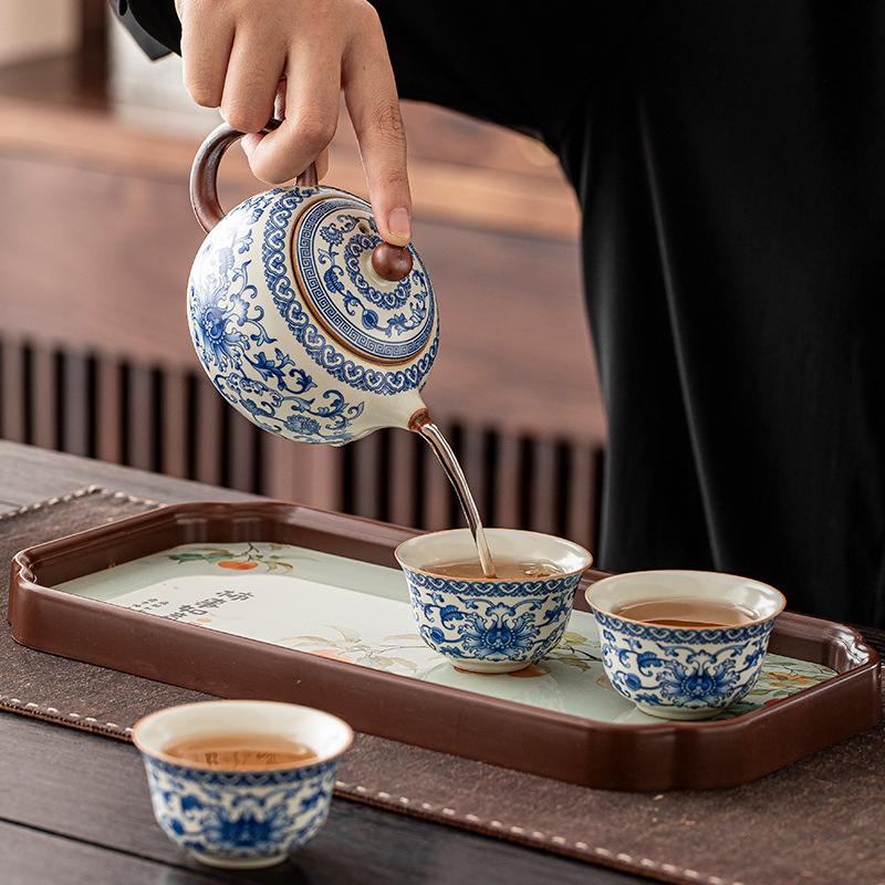 Ceainic Ru Kiln cu lotus albastru-alb, filtru ceramic cu găuri pentru bilă, set Kung Fu de ceai pentru uz casnic, ceainică și ceașcă pentru o persoană