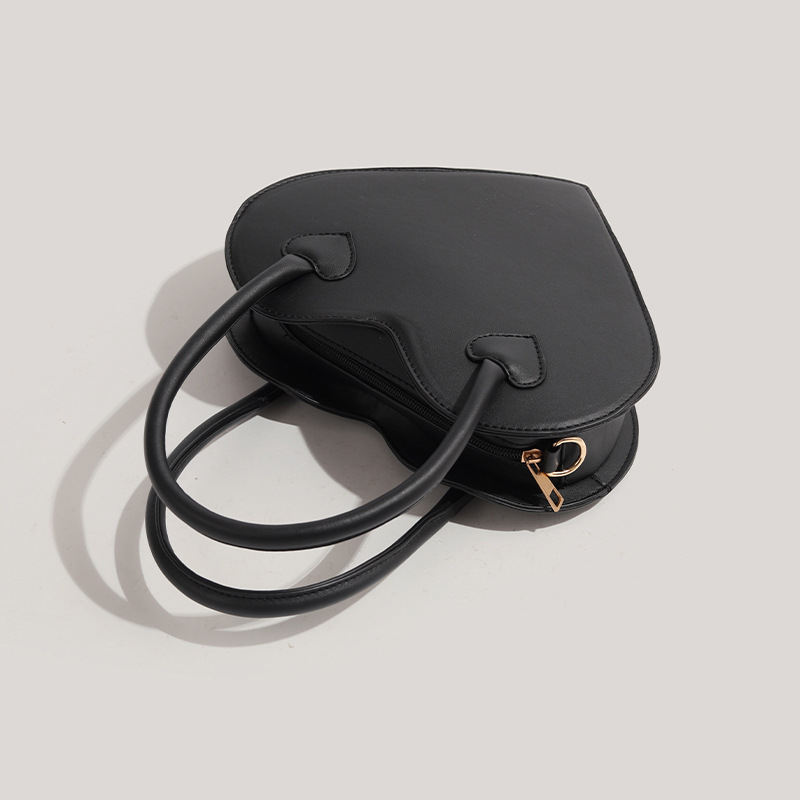 Torba u obliku srca za djevojčice, crna, minimalistički dizajn, 2026, za nošenje na rame ili crossbody