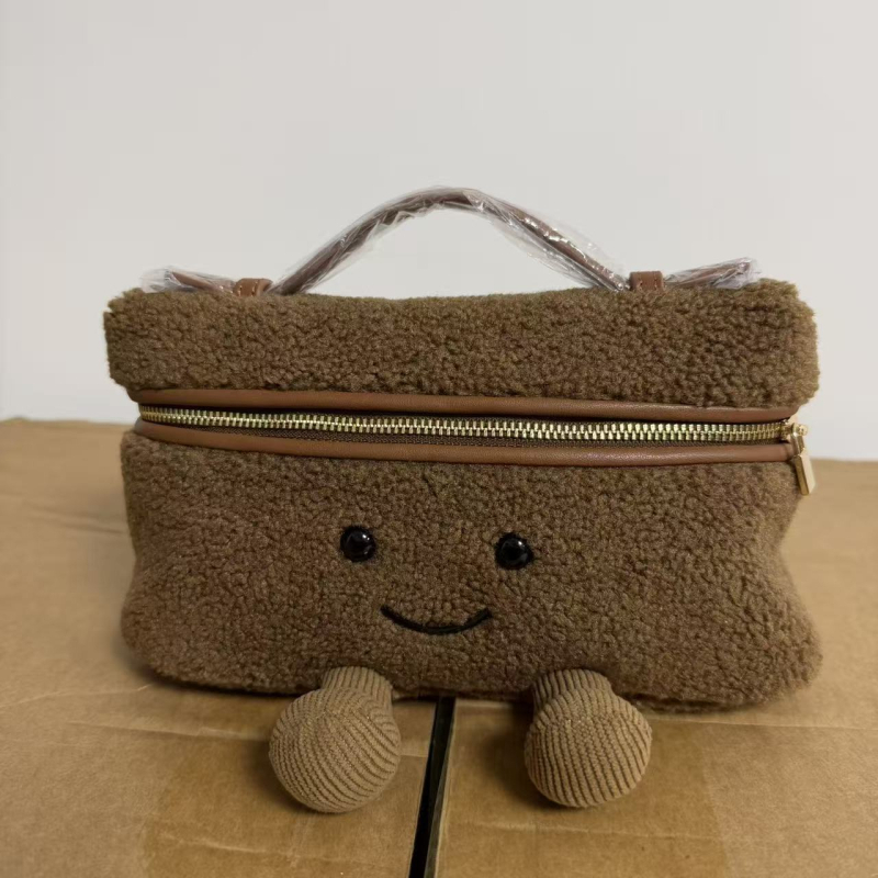 Novi nišni dizajn, proljeće 2026: pliš torbica za šminku s osmijehom, trendy crossbody torba