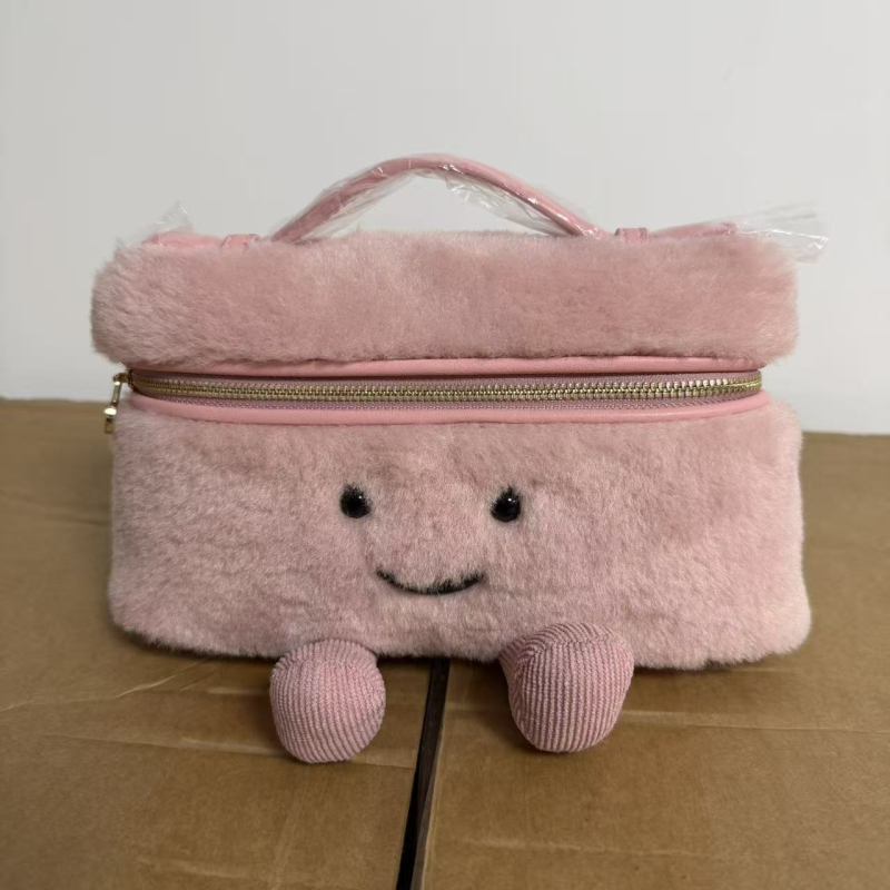 Novi nišni dizajn, proljeće 2026: pliš torbica za šminku s osmijehom, trendy crossbody torba