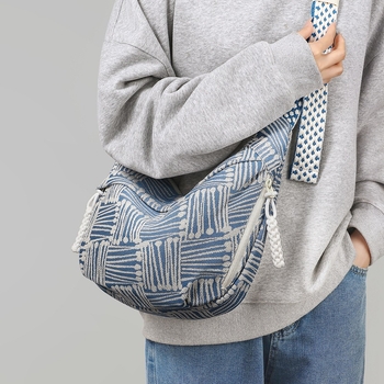 Ženska platnena torba u korejskom stilu, novi model 2026, velika kapacitet, dojam vrhunske kvalitete, široka naramenica, crossbody torba na jedno rame, svestrana platnena torba