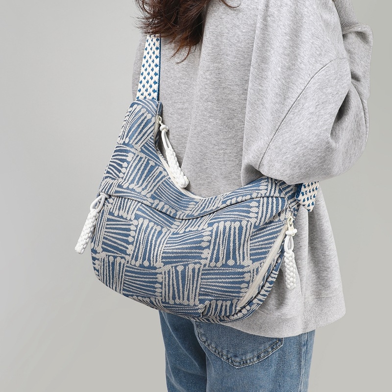 Ženska platnena torba u korejskom stilu, novi model 2026, velika kapacitet, dojam vrhunske kvalitete, široka naramenica, crossbody torba na jedno rame, svestrana platnena torba