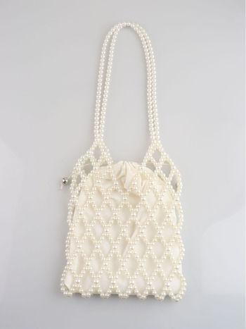 Nova torba crossbody s perlicama, s dizajnom s izraženim izrezom, elegantna i svestrana za žene