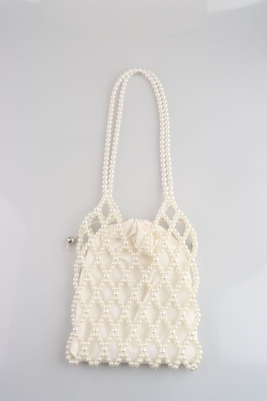 Nova torba crossbody s perlicama, s dizajnom s izraženim izrezom, elegantna i svestrana za žene