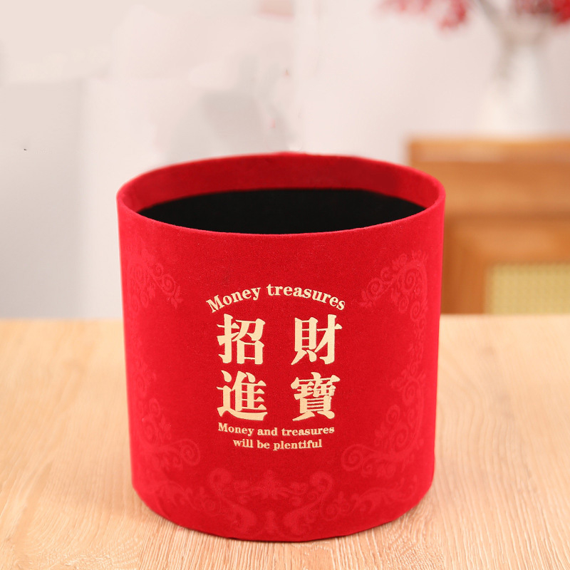 Decorațiune pentru living de Anul Nou: galeata norocului cu ornament de prosperitate