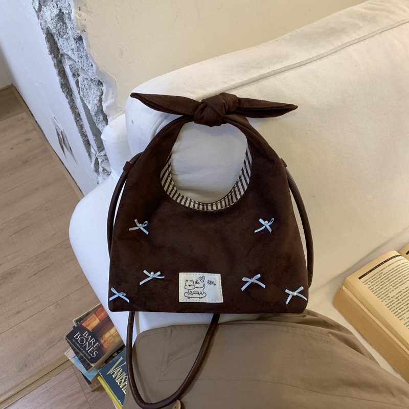 Mala ženska velur torbica s mašnicom – crossbody za svakodnevno nošenje