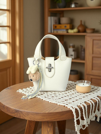 Ženska plava vedierova torbica Sea Salt s ramenskim i crossbody remenom