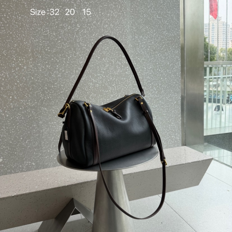 Ženska torba od prvog sloja kravlje kože, Boston jastučasti stil, color-block retro, 2026., nosi se u ruci, na ramenu ili crossbody