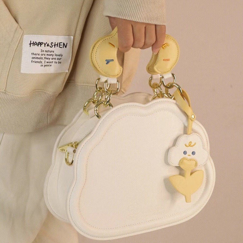 Ženska mala crossbody torba s nišnim dizajnom, inspirirana oblacima, sa strukturiranim siluetom i pretincem za telefon