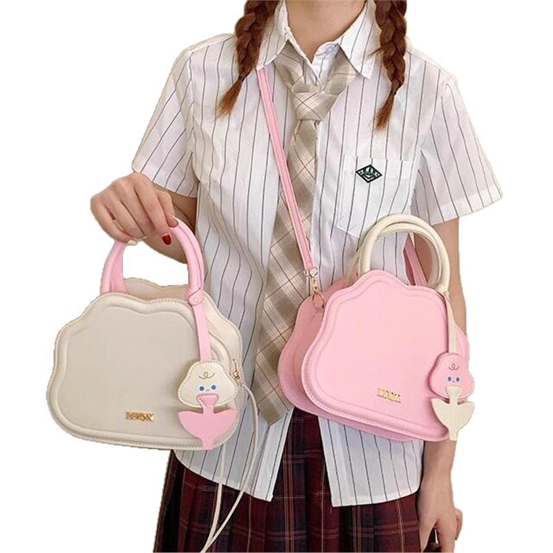 Mini ženska crossbody torba od poliester materijala, zapadni stil, ovalni oblik, zatvaranje kapom, unutarnji džep sa zipom, jedna naramenica, proljeće 2025