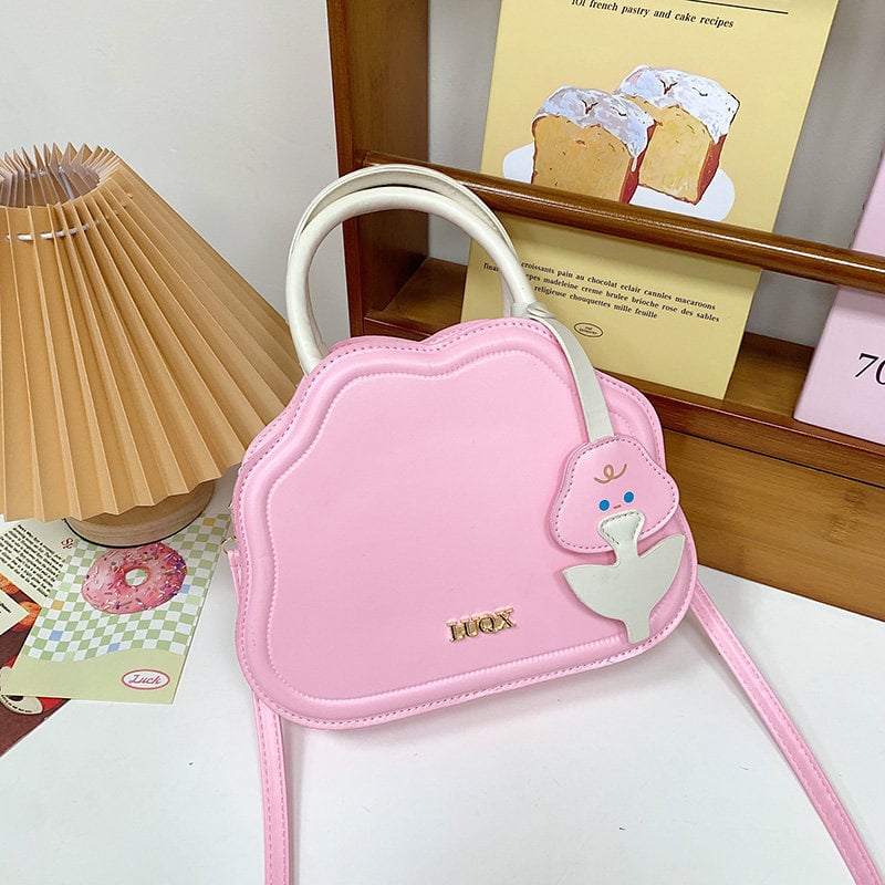 Mini ženska crossbody torba od poliester materijala, zapadni stil, ovalni oblik, zatvaranje kapom, unutarnji džep sa zipom, jedna naramenica, proljeće 2025